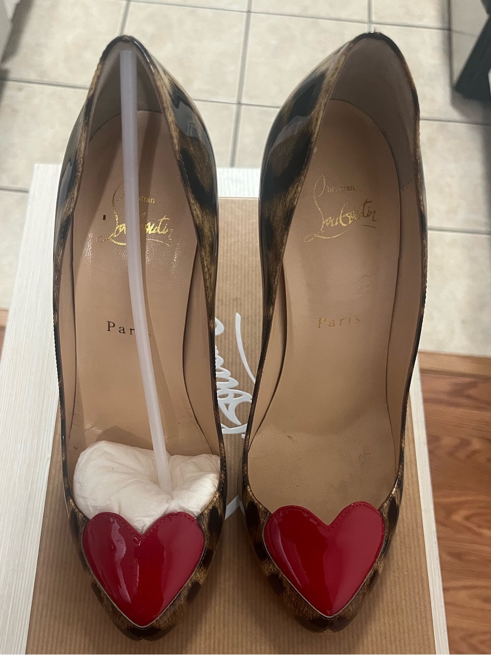 Christian Louboutin leopard heart pumps